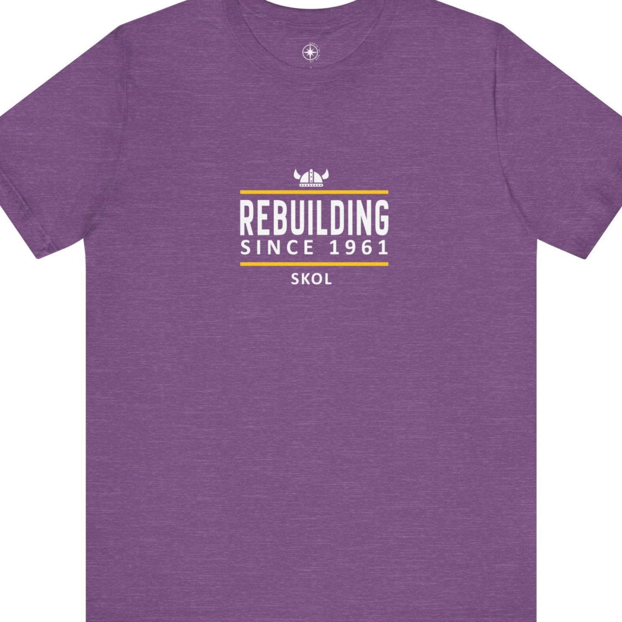 Purple t-shirt with white and yellow text that says, Rebuilding Since 1961