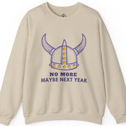 A gray crewneck sweatshirt with a Viking helmet design and the text 'NO MORE MAYBE NEXT YEAR' on the front.