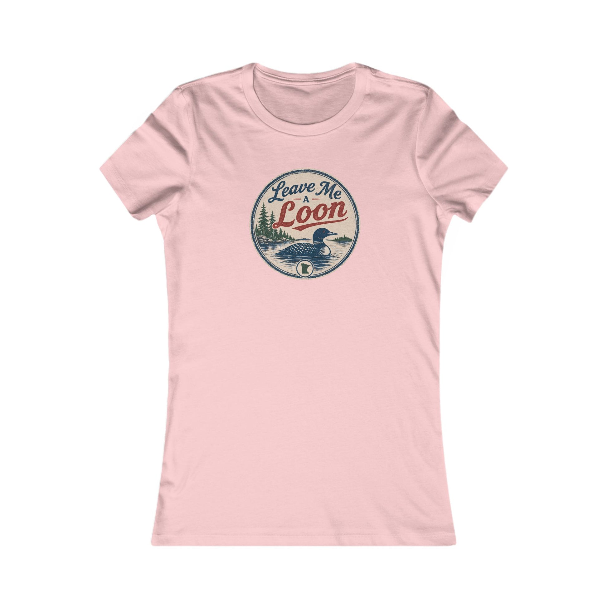 A light pink short-sleeve crewneck t-shirt with a circular vintage-style graphic on the chest featuring a loon duck and the text 'Leave Me Loon'.