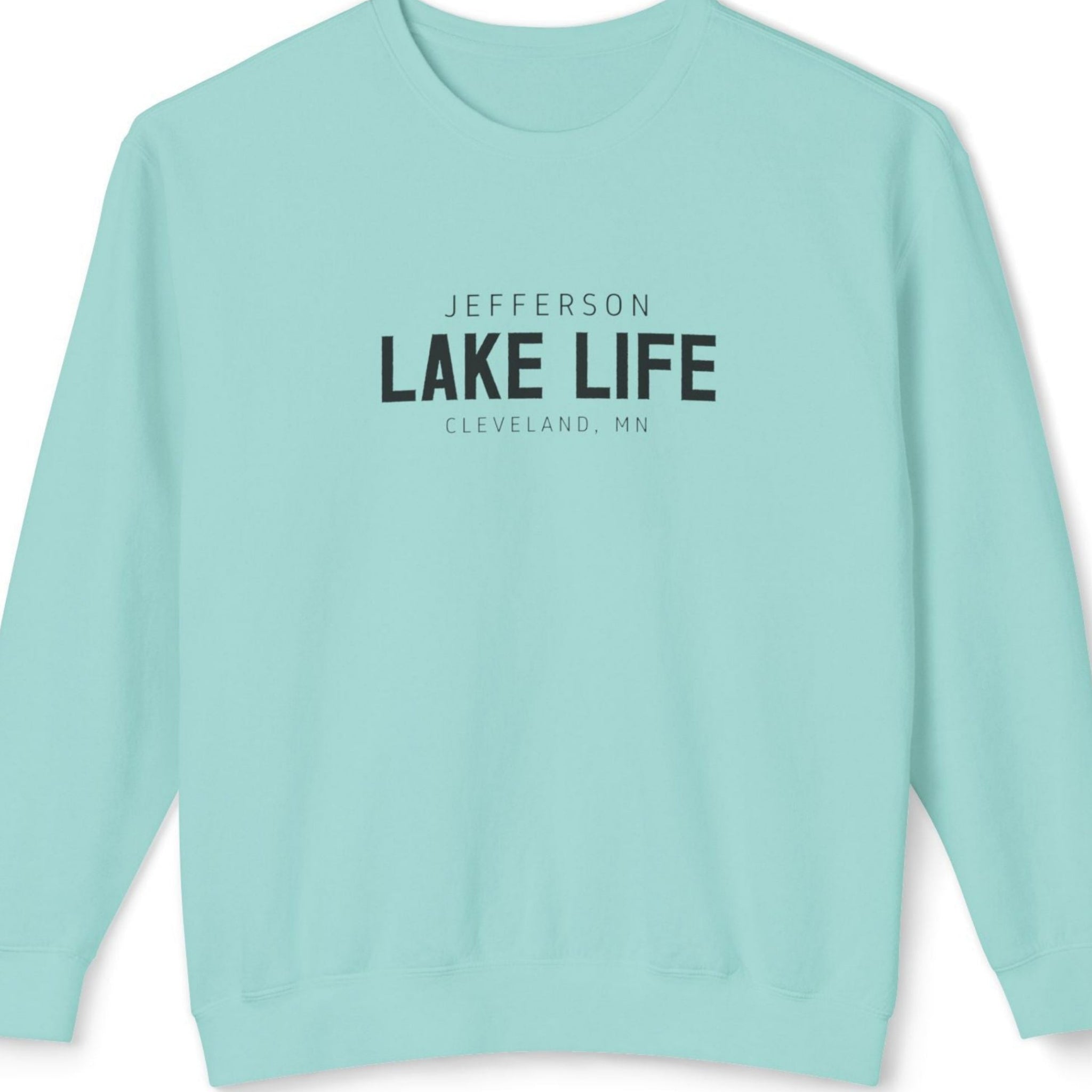 Light blue sweatshirt with 'Jefferson Lake Life Cleveland, MN' text on it.