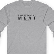 A long sleeve white shirt with the text 'WANT TO ENJOY MY MEAT' printed in capital letters.
