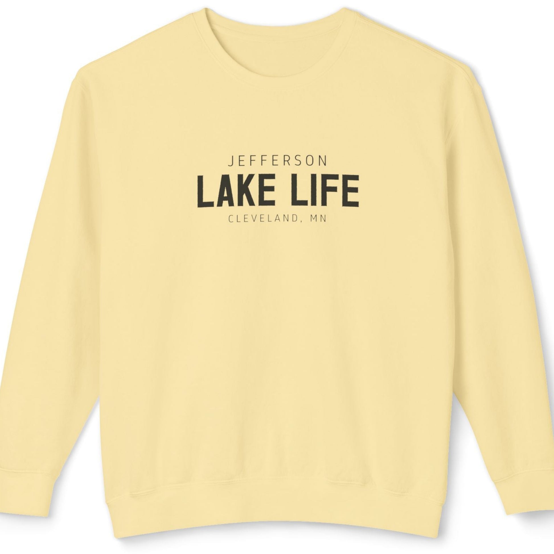 Light yellow sweatshirt with 'Jefferson Lake Life Cleveland, MN' text 